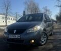 Серый Сузуки СХ4, объемом двигателя 1.6 л и пробегом 205 тыс. км за 5400 $, фото 1 на Automoto.ua
