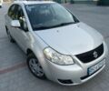 Серый Сузуки СХ4, объемом двигателя 1.6 л и пробегом 220 тыс. км за 5800 $, фото 1 на Automoto.ua