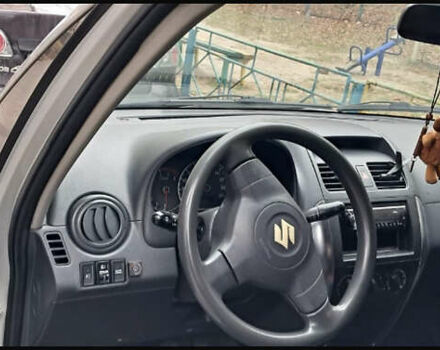 Серый Сузуки СХ4, объемом двигателя 1.6 л и пробегом 261 тыс. км за 4000 $, фото 4 на Automoto.ua