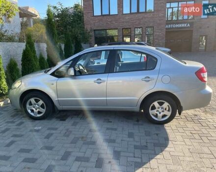 Серый Сузуки СХ4, объемом двигателя 1.6 л и пробегом 70 тыс. км за 7500 $, фото 2 на Automoto.ua