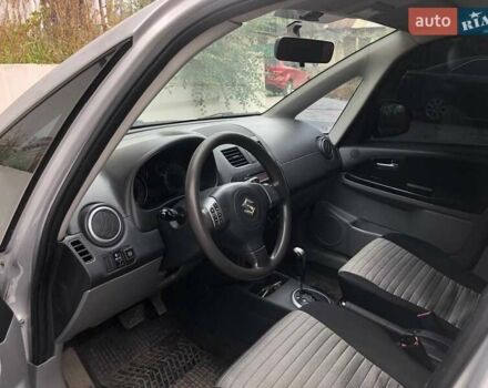 Серый Сузуки СХ4, объемом двигателя 1.59 л и пробегом 210 тыс. км за 7500 $, фото 8 на Automoto.ua