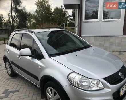 Серый Сузуки СХ4, объемом двигателя 1.59 л и пробегом 210 тыс. км за 7500 $, фото 3 на Automoto.ua