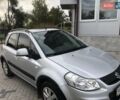 Серый Сузуки СХ4, объемом двигателя 1.59 л и пробегом 210 тыс. км за 7500 $, фото 3 на Automoto.ua