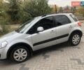 Серый Сузуки СХ4, объемом двигателя 1.59 л и пробегом 210 тыс. км за 7500 $, фото 1 на Automoto.ua