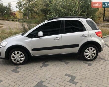 Серый Сузуки СХ4, объемом двигателя 1.59 л и пробегом 210 тыс. км за 7500 $, фото 5 на Automoto.ua