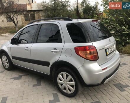 Серый Сузуки СХ4, объемом двигателя 1.59 л и пробегом 210 тыс. км за 7500 $, фото 2 на Automoto.ua