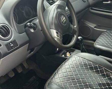 Серый Сузуки СХ4, объемом двигателя 1.6 л и пробегом 243 тыс. км за 7000 $, фото 3 на Automoto.ua