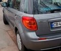 Серый Сузуки СХ4, объемом двигателя 1.6 л и пробегом 259 тыс. км за 5900 $, фото 2 на Automoto.ua