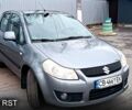 Серый Сузуки СХ4, объемом двигателя 1.6 л и пробегом 259 тыс. км за 5900 $, фото 1 на Automoto.ua