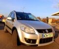 Серый Сузуки СХ4, объемом двигателя 1.9 л и пробегом 270 тыс. км за 4500 $, фото 1 на Automoto.ua