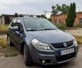 Серый Сузуки СХ4, объемом двигателя 1.6 л и пробегом 220 тыс. км за 6800 $, фото 1 на Automoto.ua