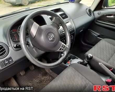 Серый Сузуки СХ4, объемом двигателя 1.6 л и пробегом 220 тыс. км за 6800 $, фото 7 на Automoto.ua