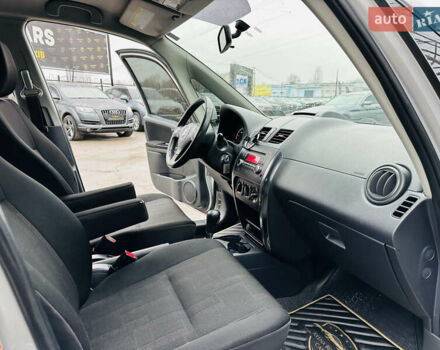 Сірий Сузукі СХ4, об'ємом двигуна 2 л та пробігом 187 тис. км за 7800 $, фото 22 на Automoto.ua