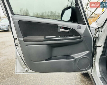 Сірий Сузукі СХ4, об'ємом двигуна 2 л та пробігом 187 тис. км за 7800 $, фото 14 на Automoto.ua