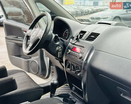 Сірий Сузукі СХ4, об'ємом двигуна 2 л та пробігом 187 тис. км за 7800 $, фото 23 на Automoto.ua