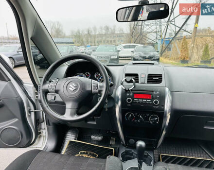 Сірий Сузукі СХ4, об'ємом двигуна 2 л та пробігом 187 тис. км за 7800 $, фото 19 на Automoto.ua