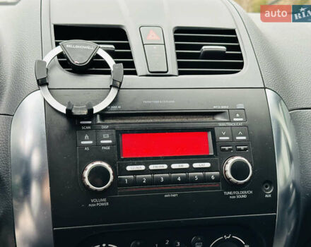 Сірий Сузукі СХ4, об'ємом двигуна 2 л та пробігом 187 тис. км за 7800 $, фото 30 на Automoto.ua