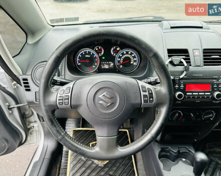 Сірий Сузукі СХ4, об'ємом двигуна 2 л та пробігом 187 тис. км за 7800 $, фото 26 на Automoto.ua