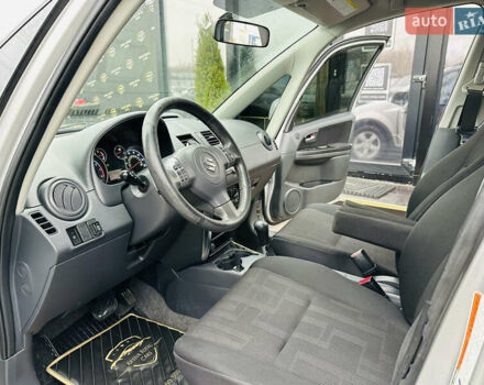 Сірий Сузукі СХ4, об'ємом двигуна 2 л та пробігом 187 тис. км за 7800 $, фото 12 на Automoto.ua