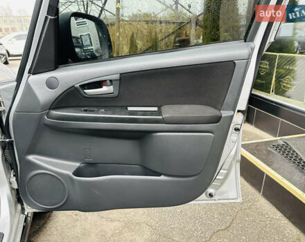 Сірий Сузукі СХ4, об'ємом двигуна 2 л та пробігом 187 тис. км за 7800 $, фото 24 на Automoto.ua