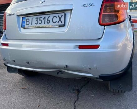 Серый Сузуки СХ4, объемом двигателя 1.59 л и пробегом 82 тыс. км за 9453 $, фото 5 на Automoto.ua