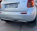 Серый Сузуки СХ4, объемом двигателя 1.59 л и пробегом 82 тыс. км за 9453 $, фото 5 на Automoto.ua
