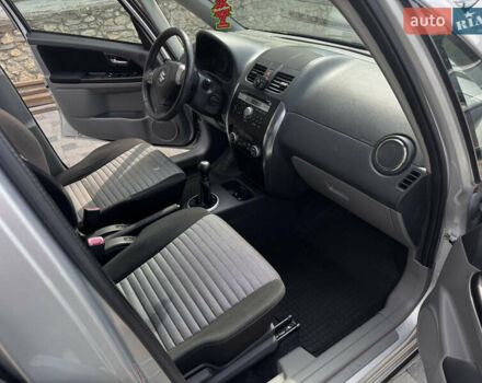 Серый Сузуки СХ4, объемом двигателя 1.6 л и пробегом 160 тыс. км за 8200 $, фото 22 на Automoto.ua