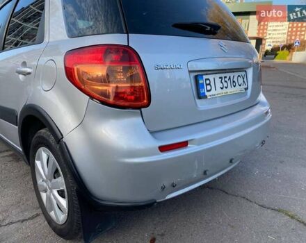 Серый Сузуки СХ4, объемом двигателя 1.59 л и пробегом 82 тыс. км за 9453 $, фото 4 на Automoto.ua