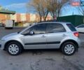 Серый Сузуки СХ4, объемом двигателя 1.59 л и пробегом 82 тыс. км за 9453 $, фото 1 на Automoto.ua