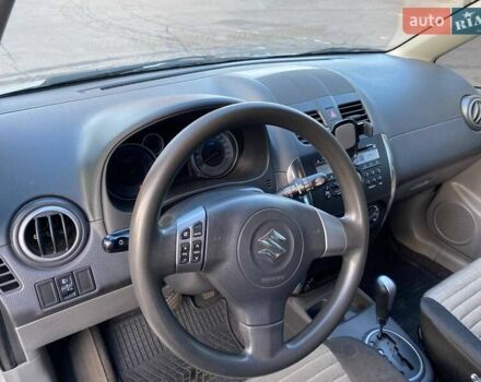 Серый Сузуки СХ4, объемом двигателя 1.59 л и пробегом 82 тыс. км за 9453 $, фото 17 на Automoto.ua