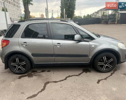 Серый Сузуки СХ4, объемом двигателя 1.59 л и пробегом 302 тыс. км за 10000 $, фото 3 на Automoto.ua