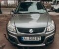 Серый Сузуки СХ4, объемом двигателя 1.59 л и пробегом 302 тыс. км за 10000 $, фото 1 на Automoto.ua