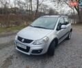 Серый Сузуки СХ4, объемом двигателя 1.6 л и пробегом 118 тыс. км за 9500 $, фото 1 на Automoto.ua