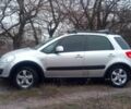 Сузуки СХ4 2013 в Светловдске на Automoto.ua Серый Сузуки СХ4, объемом двигателя 2 л и пробегом 164 тыс. км за 12500 $, фото 5 на Automoto.ua