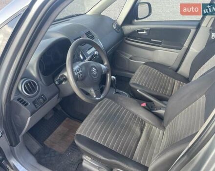 Серый Сузуки СХ4, объемом двигателя 1.59 л и пробегом 292 тыс. км за 8300 $, фото 5 на Automoto.ua