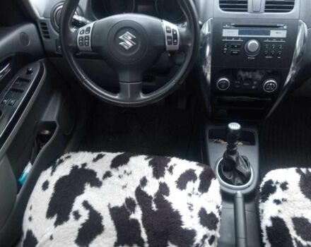 Сузуки СХ4 2013 в Светловдске на Automoto.ua Серый Сузуки СХ4, объемом двигателя 2 л и пробегом 164 тыс. км за 12500 $, фото 10 на Automoto.ua