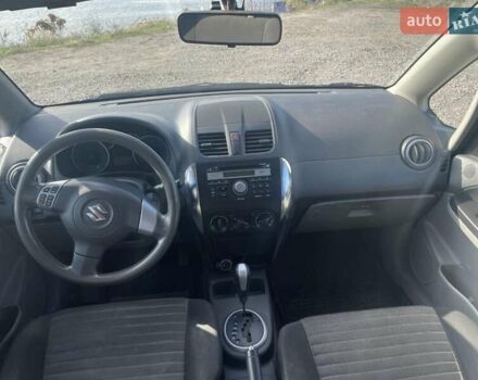 Серый Сузуки СХ4, объемом двигателя 1.59 л и пробегом 292 тыс. км за 8300 $, фото 7 на Automoto.ua