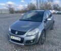 Серый Сузуки СХ4, объемом двигателя 1.59 л и пробегом 292 тыс. км за 8300 $, фото 1 на Automoto.ua