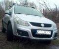 Сузуки СХ4 2013 в Светловдске на Automoto.ua Серый Сузуки СХ4, объемом двигателя 2 л и пробегом 164 тыс. км за 12500 $, фото 1 на Automoto.ua