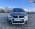 Серый Сузуки СХ4, объемом двигателя 1.59 л и пробегом 292 тыс. км за 8300 $, фото 1 на Automoto.ua