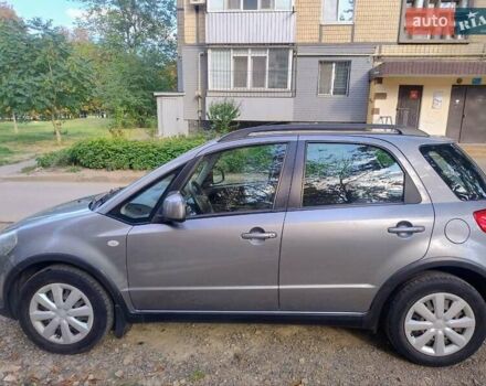 Серый Сузуки СХ4, объемом двигателя 1.59 л и пробегом 80 тыс. км за 11200 $, фото 3 на Automoto.ua