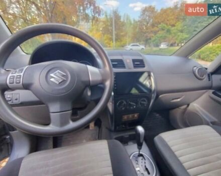 Серый Сузуки СХ4, объемом двигателя 1.59 л и пробегом 80 тыс. км за 11200 $, фото 2 на Automoto.ua
