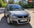 Серый Сузуки СХ4, объемом двигателя 1.59 л и пробегом 32 тыс. км за 12500 $, фото 1 на Automoto.ua