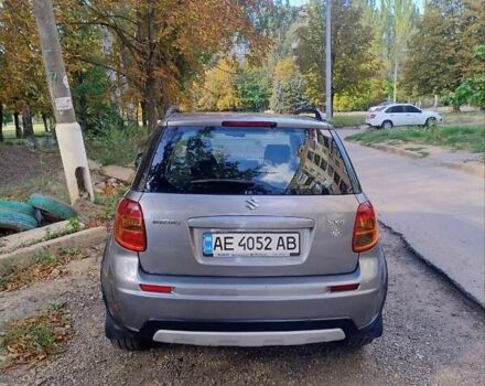 Серый Сузуки СХ4, объемом двигателя 1.59 л и пробегом 80 тыс. км за 11200 $, фото 1 на Automoto.ua