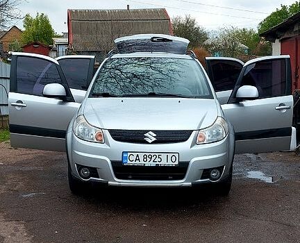 Серый Сузуки СХ4, объемом двигателя 1.6 л и пробегом 258 тыс. км за 6200 $, фото 1 на Automoto.ua