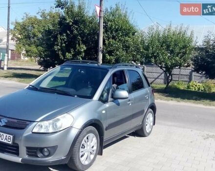 Серый Сузуки СХ4, объемом двигателя 1.4 л и пробегом 242 тыс. км за 7000 $, фото 1 на Automoto.ua