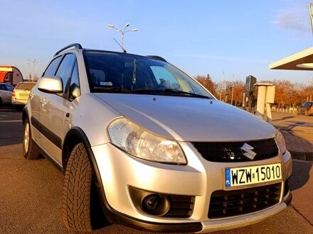 Серый Сузуки СХ4, объемом двигателя 1.9 л и пробегом 270 тыс. км за 4500 $, фото 1 на Automoto.ua