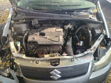 Серый Сузуки СХ4, объемом двигателя 1.6 л и пробегом 200 тыс. км за 1500 $, фото 1 на Automoto.ua