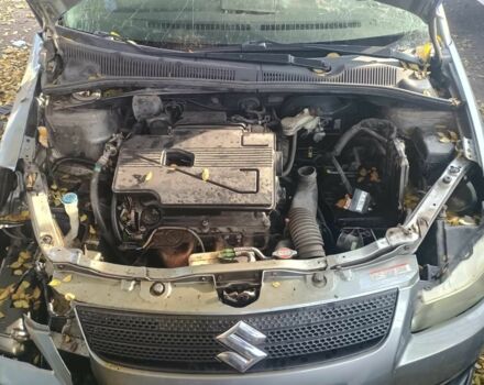 Серый Сузуки СХ4, объемом двигателя 1.6 л и пробегом 200 тыс. км за 1500 $, фото 1 на Automoto.ua