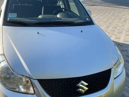 Серый Сузуки СХ4, объемом двигателя 1.6 л и пробегом 70 тыс. км за 7500 $, фото 1 на Automoto.ua